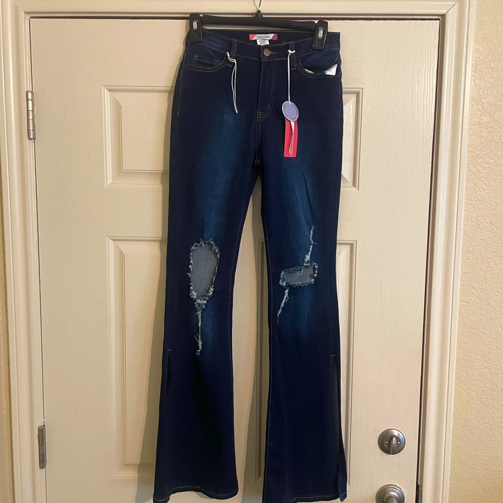 Vibe & Rant dark distressed flare jeans with slits on from mid calf to hem
